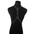 Silver chain body harness on a black mannequin against a white background