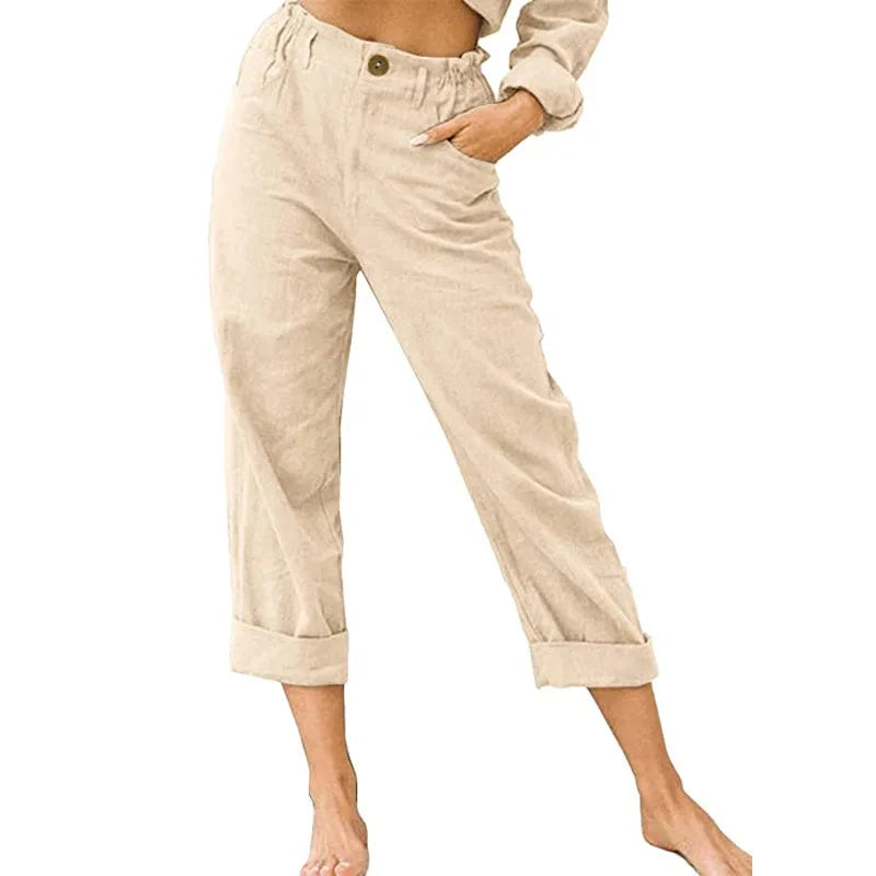 Model wearing Echo & Air women's Linen Cotton Crop Pants in beige showcasing the relaxed fit, comfortable side pocket, and rolled cuffs.