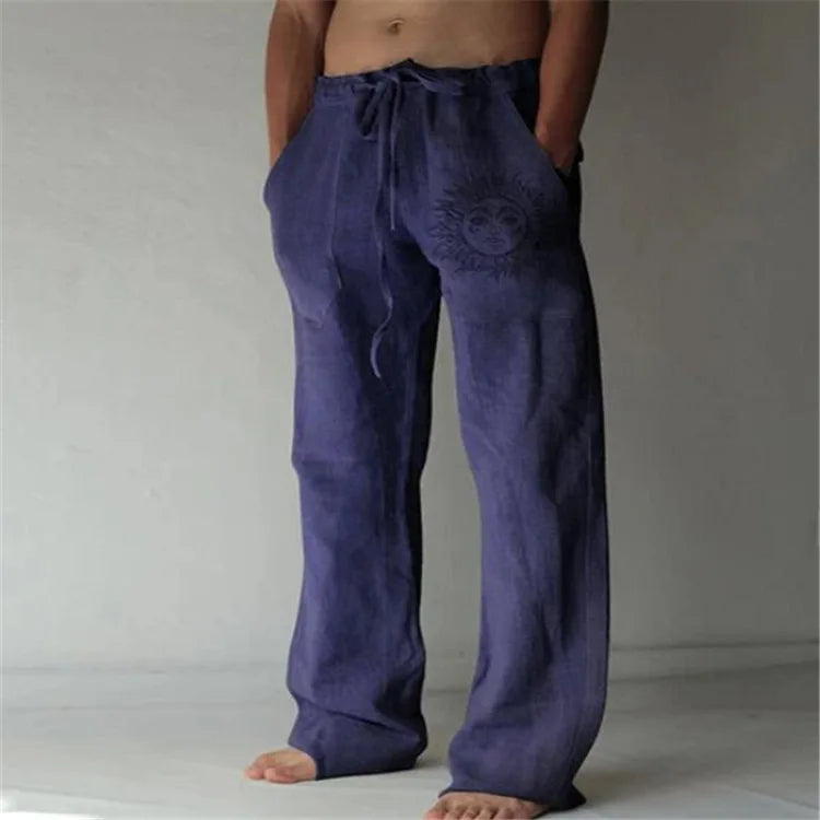 Model wearing Echo & Air men's Driftwood Slit Lounge Pant in dusty blue styled with a casual shirt.