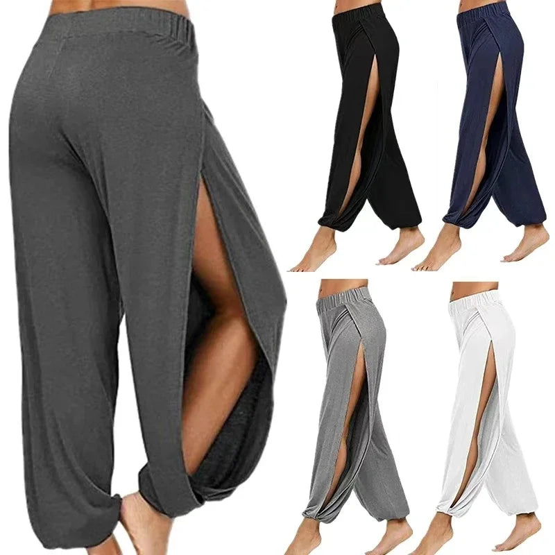Four models showcasing the Echo & Air Ethereal Side-Slit Lounge Pants in gray, black, navy blue, and white, displaying the high leg slits and relaxed harem silhouette.