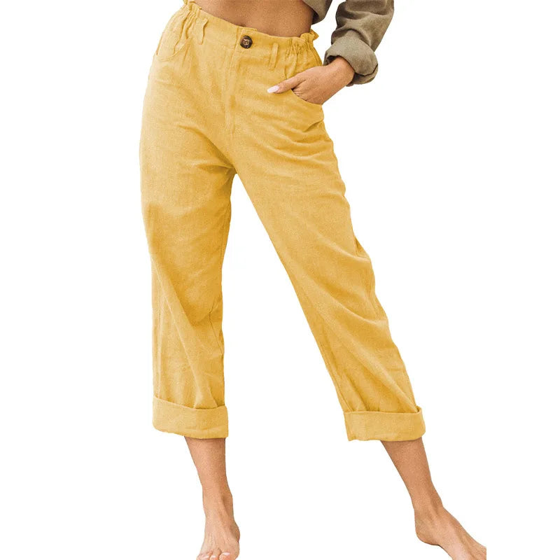 Model wearing Echo & Air women's Linen Cotton Crop Pants in yellow showcasing the relaxed tapered harem fit, comfortable side pockets, and rolled cuffs.