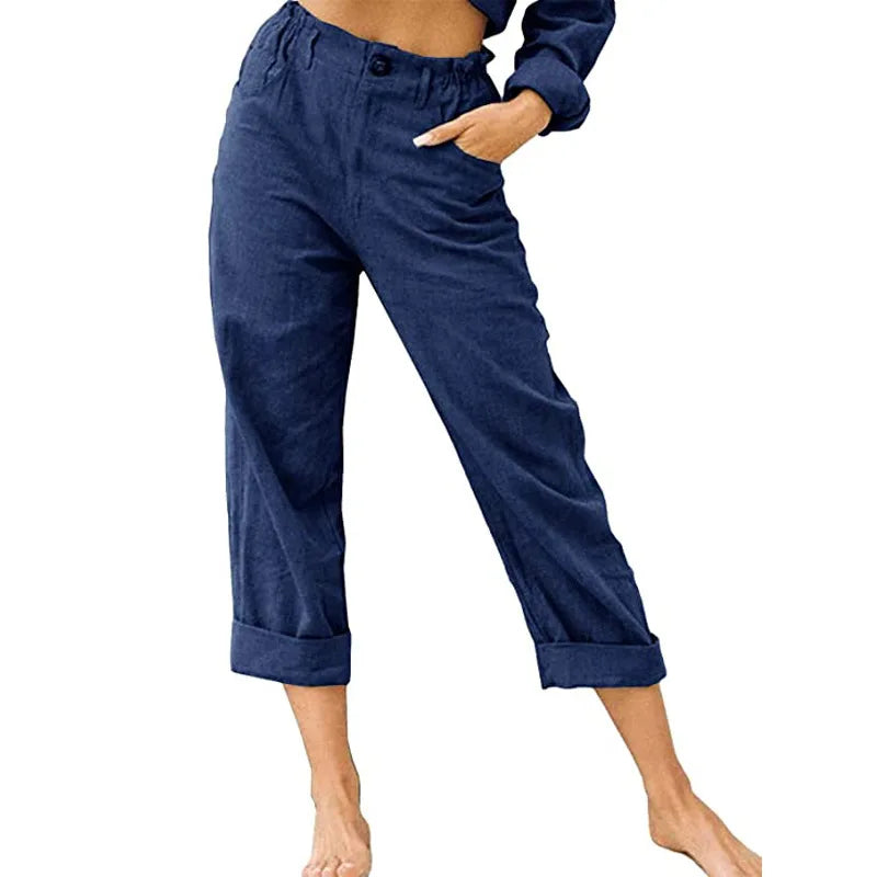 Model wearing Echo & Air women's Linen Cotton Crop Pants in blue showcasing the relaxed fit, comfortable side pocket, and rolled cuffs.