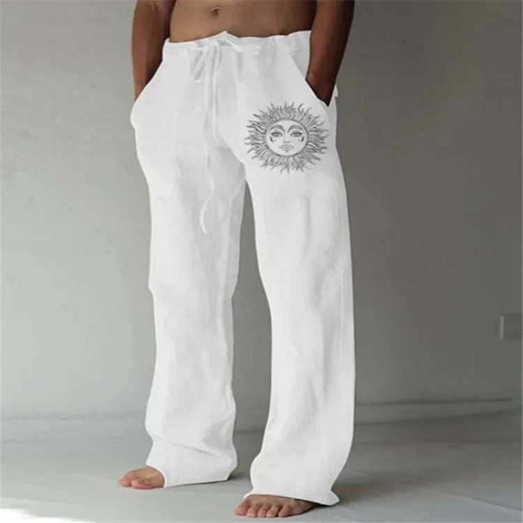 Model wearing Echo & Air men's Driftwood Slit Lounge Pant in white featuring a relaxed fit and unique side-slit hem