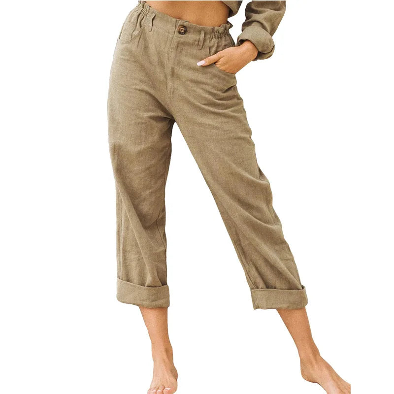 Model wearing Echo & Air women's Linen Cotton Crop Pants in khaki showcasing the relaxed fit, comfortable side pocket, and rolled cuffs.
