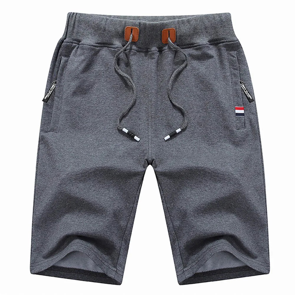 Dark grey mid-length men's cotton shorts designed for versatile summer and beach styling by Echo & Air.
